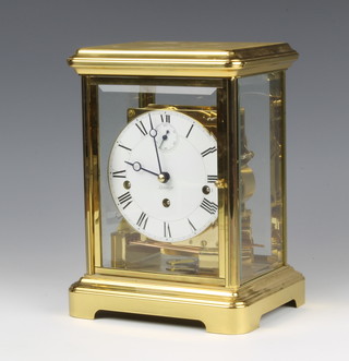 Kieninger, a 20th Century 4 glass chiming mantel clock with enamelled dial and subsidiary second hand, the back plate marked J0212, complete with key 