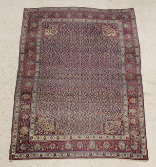 An early 20th Century Persian Ghom carpet 195cm x 137cm 