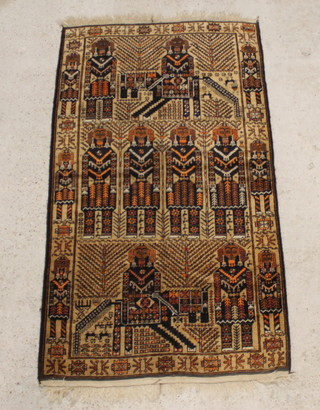 A brown and black ground Belouche rug decorated standing figures 197cm x 110cm