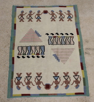 A white ground Moroccan Kilim decorated pyramids and figures 178cm x 126cm 