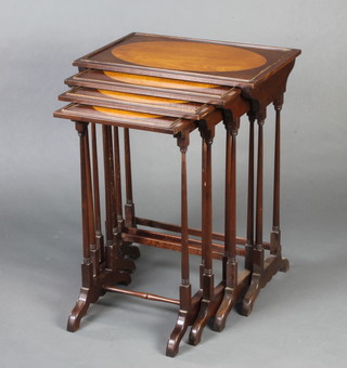 A quartetto of Edwardian style rectangular interfitting coffee tables raised on turned supports 71cm h x 57cm w x 36cm d  