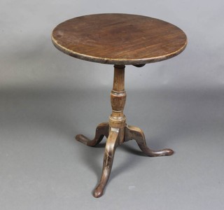 A 19th Century circular mahogany snap top tea table raised on pillar and tripod base 68cm h x 60cm w 