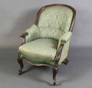 A William IV mahogany show frame mahogany tub back armchair upholstered in green material, the seat of serpentine outline, raised on cabriole supports 