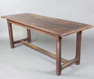 An oak rectangular refectory table raised on 4 chamfered supports with H framed stretcher 75cm h x 196cm w x 73cm d 