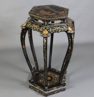 A hexagonal black lacquered chinoiserie 2 tier jardiniere stand, raised on 6 cabriole supports 100cm h x 40cm w x 45cm d 