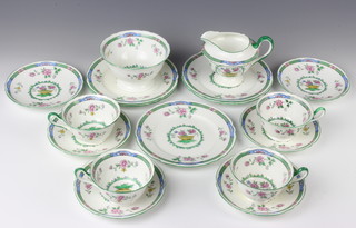 A Shelley Milton shape floral tea set no.11810 comprising 4 tea cups, 6 saucers, 5 plates, milk jug and sugar bowl 