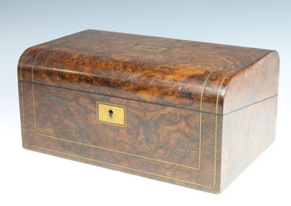 A Victorian brass and inlaid walnut D shaped writing slope, the interior fitted inkwells 16cm x 35cm x 23cm d 