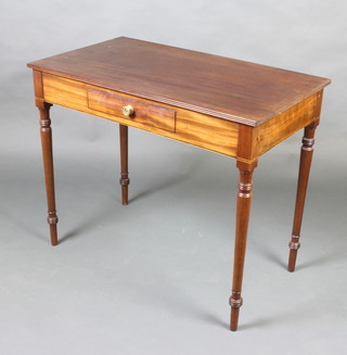 A Georgian inlaid mahogany side table fitted a drawer and raised on turned supports 75cm x 91cm x 52cm 