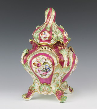 A Victorian Rockingham style pink glazed porcelain potpourri with floral panels 34cm 

