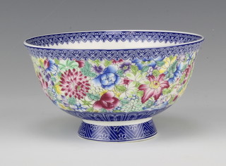 An 18th Century style Chinese famille rose flared neck bowl decorated with a band of flowers, the base with a 6 character mark 13cm 