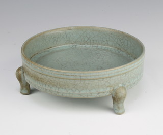 A Chinese Celadon crackle glazed circular shallow bowl raised on 3 scroll feet 15.5cm 