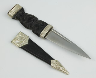 J Norvill and Sons Ltd, a durk with 9cm blade marked Skean-dhu complete with leather scabbard 