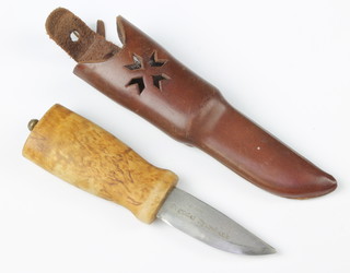 Helle, a Norwegian skinning knife, the 7cm blade marked Sogndal Sparebank complete with leather scabbard