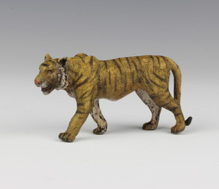 A cold painted bronze figure of a walking tiger 5cm x 10cm 