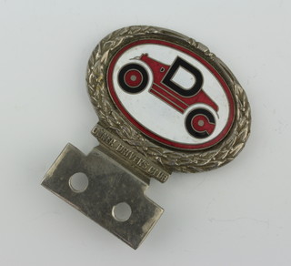 A chrome and enamel Owner Driver's Club badge, the reverse marked 4680 