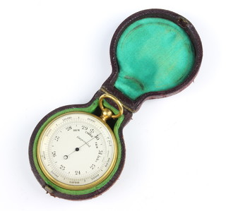 A pocket barometer with silvered dial contained in a gilt metal case complete with original outer case 