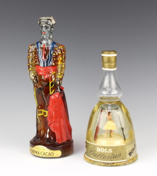 A bottle of Bols Golden liqueur and a bottle of Crema Cacao 