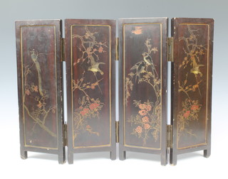 A Chinese lacquered 4 fold table screen decorated birds amidst branches 38cm x 54cm when open x 13cm when closed 
