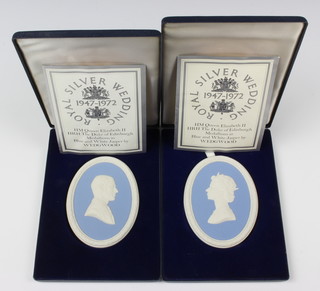 A pair of Wedgwood blue Jasper medallions HM Queen Elizabeth II and HRH The Duke of Edinburgh 11cm x 8cm, boxed