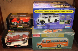 3 Burago model racing cars together with 2 Sun Star model Bedford motor coaches and 2 OC model motor coaches boxed