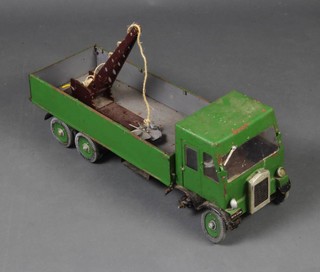 A metal scratch built model of a lorry, the back fitted a crane 23cm h x 58cm l x 20cm w (1 wheel missing) 