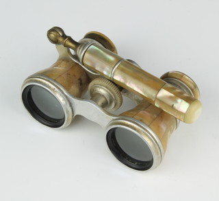 A pair of chrome and mother of pearl opera glasses