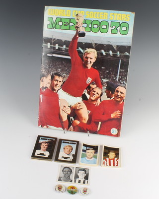 Two World Cup Willie badges, a Stanley Matthews badge and a small collection of ABC trade cards, together with a 1970 World Cup Soccer Stars picture card album  