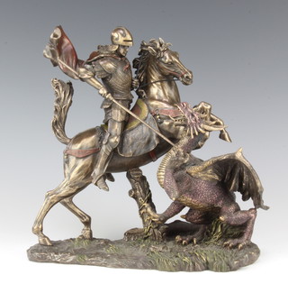 A bronzed figure of St George slaying the dragon 27cm x 26cm x 13cm 