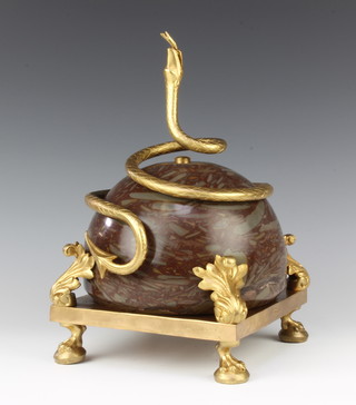 A veined marble and gilt metal table centrepiece decorated a rearing serpent, raised on hoof feet the base marked Guivrerie St Cloi 30cm h x 20cm x 20cm 