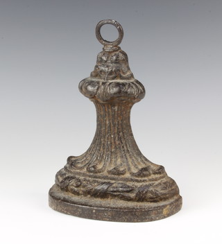 A Victorian cast iron doorstop in the form of a spreading swag 22cm x 17cm x 7cm 