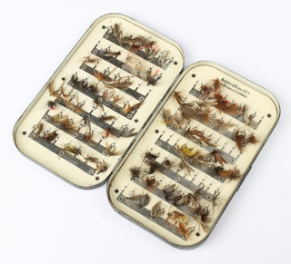An Army & Navy 1920's black Japanned trout fishing fly box with a selection of flies 