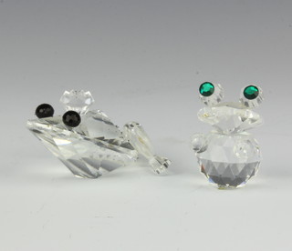 A Swarovski figure of a seated frog 5cm and one other frog 3cm, boxed