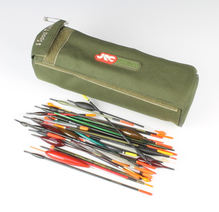 A J.R.C tube bag containing a collection of approx. 100 coarse fishing floats
