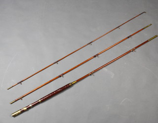 A Victorian 13' three piece salmon fishing rod with ceramic eyes and agate tip eye and leather bound handle, circa 1900 
