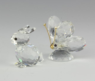 A Swarovski figure of a butterfly 3cm and one other rabbit 4cm, boxed