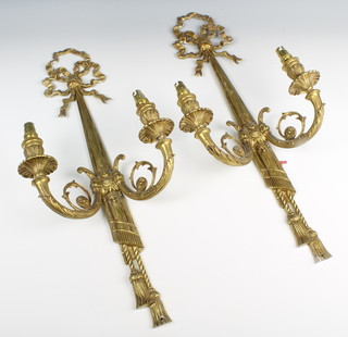 A pair of gilt metal twin light wall light brackets with swag decoration 62cm x 26cm 