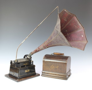 An Edison model C gem phonograph no.221852 complete with handle, horn and case
