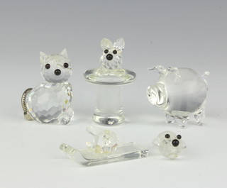 A Swarovski figure of a cat 3cm, a Crystal Reflections glass bottle stopper in the form of a seated dog, a glass bottle of a pig and figure of a snowman on a sleigh (f) 