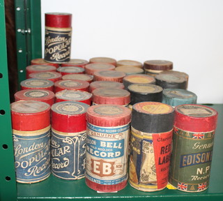 Thirteen London Poplar record phonograph cylinders, 8 Edison Bell gold moulded record phonograph cylinders, 3 Edison Bell gold moulded cylinders in blue cases, 2 The Clarion record ditto, a Clarion ditto with red label, a Genuine Edison Bell NP, Colombia, an Edison Amberol record and a Sterling ditto 
