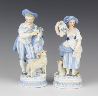 A pair of "Meissen" porcelain figures of standing boy with lamb and girl with pigeon 16cm, the base with stylised crossed swords mark 