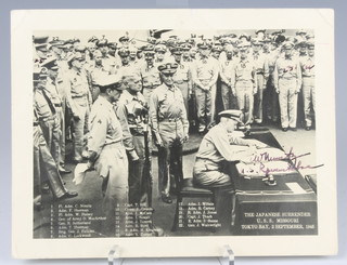 A black and white photograph - The signing of the Japanese surrender aboard U.S.S. Missouri in Tokyo Bay September 2 1945, signed by Admiral Chester Nimitz 15cm x 19cm  