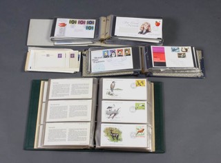 Two albums of Elizabeth II GB first day covers and the official collection Worldlife Wild Fund first day covers