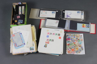 Two albums of GB first day covers, various GB and world stamps on album pages, theatre programmes etc 