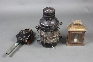 A Davey's pattern improved regulation ships lantern converted to electricity (glass damaged) together with a 19th Century Japanned and brass coaching lamp (damaged) and a reproduction Victorian brass wall lantern converted to electricity 28cm x 19.5cm x 10cm