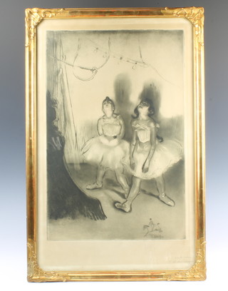A French 19th Century etching of 2 ballerinas in the wings looking up and forward, signed in pencil, 65cm x 41cm,  contained in a gilt frame 
