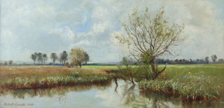 Walter Goldsmith, 1888 (1880-1930), oil on canvas, water meadows with trees, hills in distance, signed and dated  22cm x 44cm 