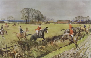 Lionel Edwards (1897-1966), a coloured print "The Old Surrey and Burstow Foxhounds at Burstow" 36cm x 51cm  