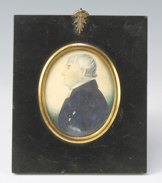 An 18th Century portrait miniature of a gentleman wearing a blue coat contained in a black and gilt mounted frame 7cm x 6cm 