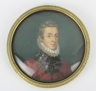 A portrait miniature on paper, study of a 17th Century courtier contained in a circular gilt frame 9cm 
