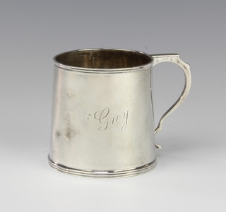 A silver mug of tapered form with S scroll handle Birmingham 1946, 7cm, 115 grams